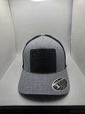 OAF Operation American Freedom black patch on a gray and black Flexfit 110 hat