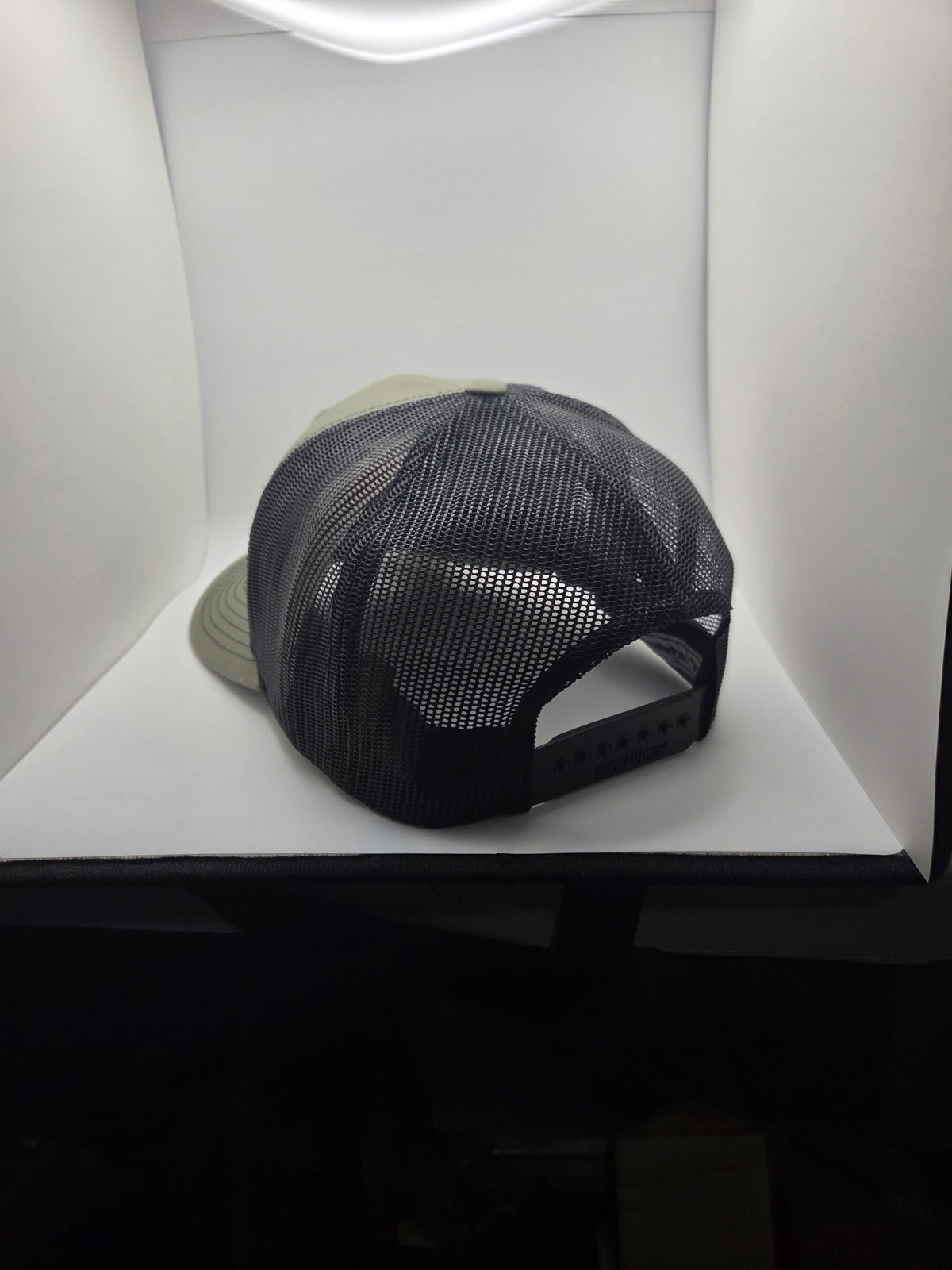 The Dirty black patch Richardson 112FP trucker hat in olive and black