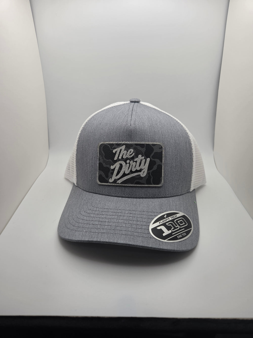 The Dirty dark camo patch Flexfit 110 hat with gray heather-look front and white mesh back