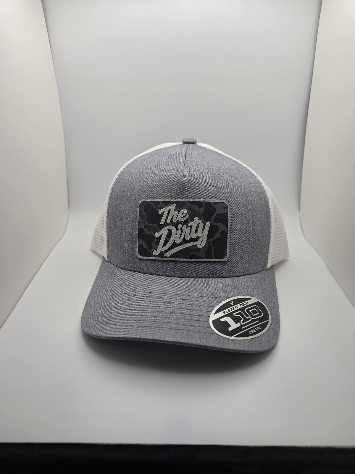 The Dirty dark camo patch Flexfit 110 hat with gray heather-look front and white mesh back