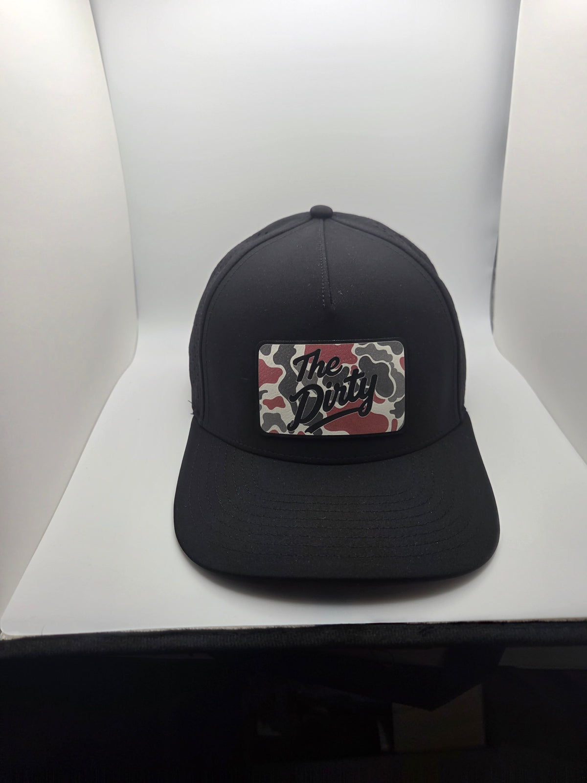 The Dirty red camo patch on a black TOAD hat