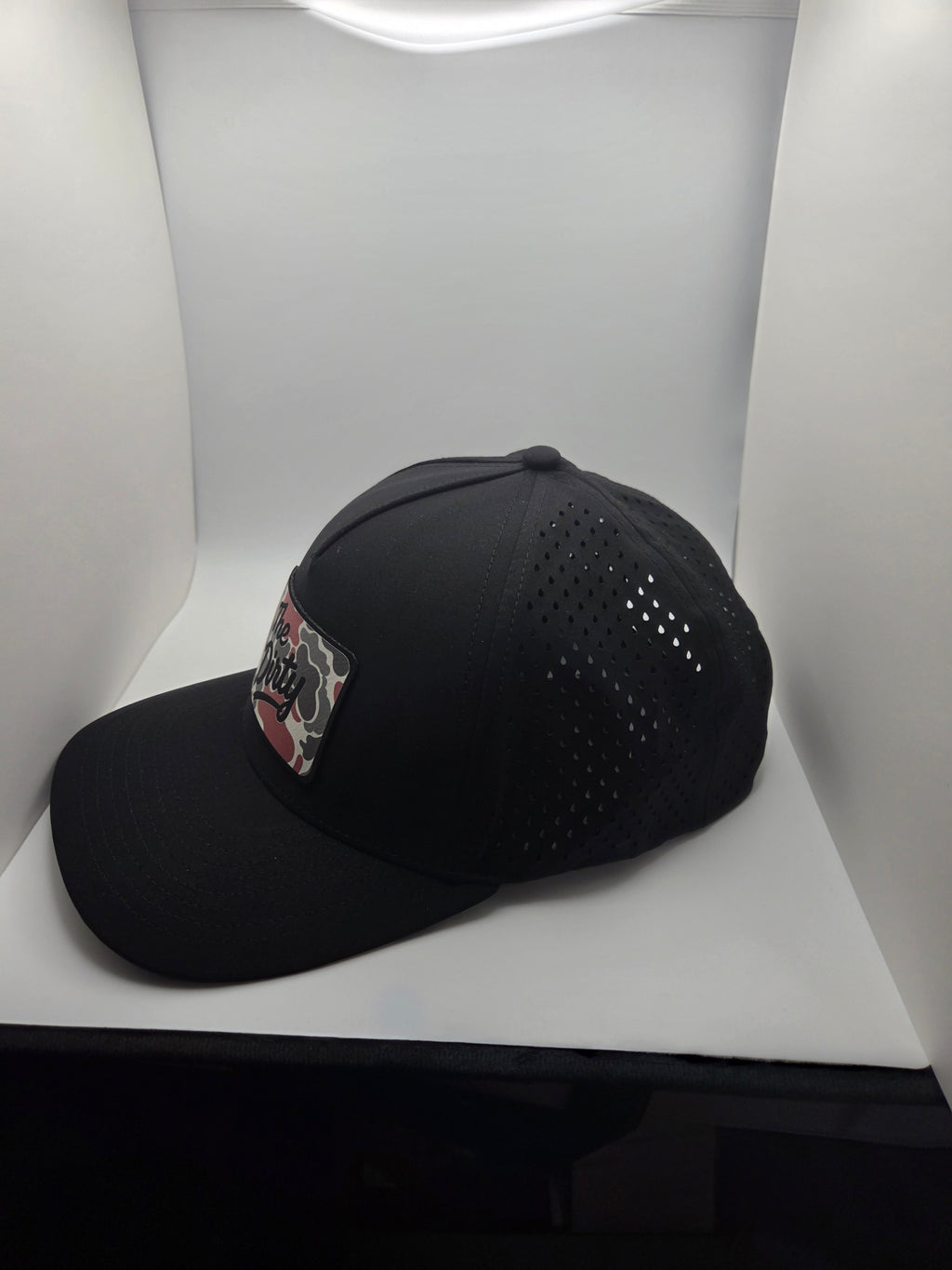 The Dirty red camo patch on a black TOAD hat